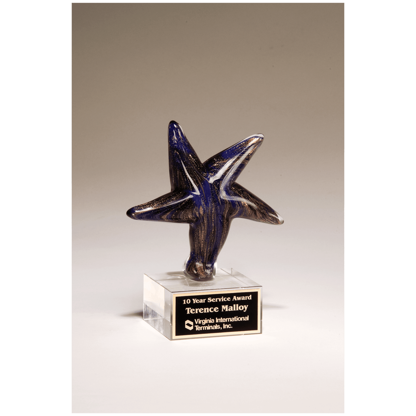 Blue Star Art Glass w/Gold Metallic Highlights on Clear Glass Base & Black Aluminum Plate